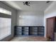 Bright dining room featuring custom built-in shelving and modern lighting fixture at 1400 Eagle Crest Blvd, Winter Haven, FL 33881
