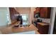 Modern kitchen featuring stone countertops, stainless appliances, and ample cabinet space at 1400 Eagle Crest Blvd, Winter Haven, FL 33881