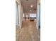 Open-concept living room featuring tile flooring, neutral paint, and natural light at 1400 Eagle Crest Blvd, Winter Haven, FL 33881