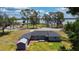 Aerial shot showcases a home near a lake and public park at 1515 W Lake Cannon Nw Dr, Winter Haven, FL 33881