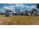 Spacious backyard offers ample room and includes a large shed at 1515 W Lake Cannon Nw Dr, Winter Haven, FL 33881