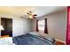 Bedroom with double door closet and natural light at 1515 W Lake Cannon Nw Dr, Winter Haven, FL 33881