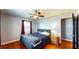 Bedroom featuring hardwood floors, ceiling fan, and natural light at 1515 W Lake Cannon Nw Dr, Winter Haven, FL 33881