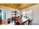 Dining room featuring a wooden ceiling, a wooden table, and an antique-looking hutch at 1515 W Lake Cannon Nw Dr, Winter Haven, FL 33881