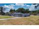 Lovely one-story home with a large lawn at 1515 W Lake Cannon Nw Dr, Winter Haven, FL 33881