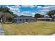 Charming single-story home with a well-maintained lawn at 1515 W Lake Cannon Nw Dr, Winter Haven, FL 33881
