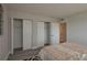 Bright bedroom featuring a neutral color palette, and ample closet space at 1700 6Th Nw St # C26, Winter Haven, FL 33881