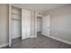 A bedroom featuring gray floors, closet and bright natural lighting at 1700 6Th Nw St # C26, Winter Haven, FL 33881
