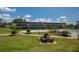 Expansive green space offers residents recreational areas, grill, pool, and shuffleboard at 1700 6Th Nw St # C26, Winter Haven, FL 33881
