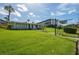 Well-maintained community exterior with lush landscaping and convenient access at 1700 6Th Nw St # C26, Winter Haven, FL 33881