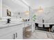 Luxurious bathroom featuring a freestanding tub, rainfall shower, and double sink vanity at 1850 S Lake Reedy Blvd, Frostproof, FL 33843