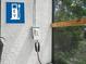 Exterior EV charger with sleek design, promotes sustainable living and enhances convenience for electric vehicle owners at 1850 S Lake Reedy Blvd, Frostproof, FL 33843
