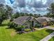 Lush landscaping surrounds this beautiful single Gathering home at 1902 Southern Dunes Blvd, Haines City, FL 33844