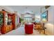 Spacious living room featuring vaulted ceilings and an expansive backyard view with a pool at 1902 Southern Dunes Blvd, Haines City, FL 33844