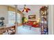 Cozy living room with comfortable leather sofa, glass table, and decorative bookshelf at 1902 Southern Dunes Blvd, Haines City, FL 33844