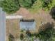 Overhead shot of the home highlighting the new roof and the surrounding spacious grounds at 1949 Old Bartow Rd, Lake Wales, FL 33859