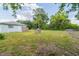Spacious yard featuring a wooden shed and plenty of open green space for recreation at 1949 Old Bartow Rd, Lake Wales, FL 33859