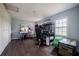 Bedroom/Office space featuring dark wood floors, and a vanity and gaming PC at 1949 Old Bartow Rd, Lake Wales, FL 33859