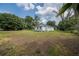 Charming home featuring a well-maintained exterior and a large front yard at 1949 Old Bartow Rd, Lake Wales, FL 33859