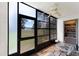 Enclosed porch features ceiling fan and views of the outside area at 2180 San Marcos Se Cir # 401, Winter Haven, FL 33880