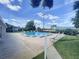 Community pool area with ample seating, perfect for relaxing or entertaining guests at 2180 San Marcos Se Cir # 401, Winter Haven, FL 33880