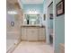 This bathroom features a large vanity and shower! at 250 Brigham Nw Rd, Winter Haven, FL 33881