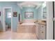 This bathroom has both a bathtub, stand up shower and a separated lavatory at 250 Brigham Nw Rd, Winter Haven, FL 33881