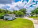 Spacious single-Gathering home with lush front yard and an extra garage at 250 Brigham Nw Rd, Winter Haven, FL 33881