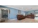 The spacious living room features tile flooring, recessed lighting, and comfortable seating at 250 Brigham Nw Rd, Winter Haven, FL 33881