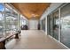 Spacious screened-in patio with comfortable seating, ceiling fan, and ample lighting at 250 Brigham Nw Rd, Winter Haven, FL 33881