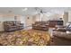 Cozy theater room offers carpet, an beverage station, and comfortable seating, perfect for enjoying movies with Gathering and friends at 250 Brigham Nw Rd, Winter Haven, FL 33881