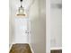 Bright foyer featuring tile flooring, fresh white walls, and a classic light fixture at 251 Kings Pond Ave, Winter Haven, FL 33880