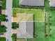 Aerial view showing the property's boundaries, home, and surrounding landscaping at 2824 Attwater Loop, Winter Haven, FL 33884