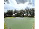 Get active on the basketball court, surrounded by lush trees and landscaping at 2824 Attwater Loop, Winter Haven, FL 33884