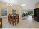Open dining area seamlessly connects to living room, perfect for entertaining at 2824 Attwater Loop, Winter Haven, FL 33884