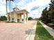 Well-maintained guard house at the entrance of the community at 2824 Attwater Loop, Winter Haven, FL 33884