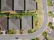 Aerial view of several homes in a quiet neighborhood on a winding street at 2980 Dayton Dr, Winter Haven, FL 33884