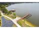 Aerial view showcasing lake access, a charming gazebo, and the surrounding natural beauty at 2980 Dayton Dr, Winter Haven, FL 33884