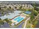 Aerial view showcasing the community center pool, parking and surrounding neighborhood at 2980 Dayton Dr, Winter Haven, FL 33884