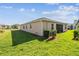 Exterior home view highlighting the well-maintained lawn and neat landscaping at 2980 Dayton Dr, Winter Haven, FL 33884