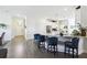 Modern kitchen featuring a breakfast bar with stylish seating and an open view to the entryway at 2980 Dayton Dr, Winter Haven, FL 33884