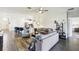 Open concept living room with tile flooring and access to the kitchen and dining area at 2980 Dayton Dr, Winter Haven, FL 33884