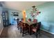 Dining room featuring stylish table with seating for six, perfect for Gathering gatherings at 3022 Hickory Nw St, Winter Haven, FL 33881