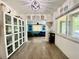 Bright hallway leads into the living room with nice flooring and natural light at 3022 Hickory Nw St, Winter Haven, FL 33881