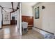 Functional laundry room features tiled floors, wood trim and laundry sink at 305 Armour Ave, Auburndale, FL 33823