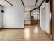 Bright open living space features neutral walls, tile floors, and modern architectural details at 305 Armour Ave, Auburndale, FL 33823