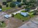 Birds-eye view of the beautiful property featuring mature trees, guest house and a serene and private approach at 3805 Mammoth Grove Rd, Lake Wales, FL 33898