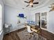 Office space with dual monitors, stylish decor, and glass doors leading to another room at 3805 Mammoth Grove Rd, Lake Wales, FL 33898