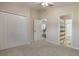 Bedroom showcasing a large closet, plush carpet, and an ensuite bathroom at 3844 Bedford Ave, Winter Haven, FL 33884