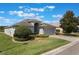 Attractive home with paver driveway, manicured lawn, and a convenient two-car garage at 3844 Bedford Ave, Winter Haven, FL 33884